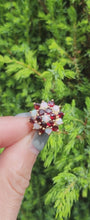 Load and play video in Gallery viewer, 1596: Vintage:  9ct Gold White Opals Red Garnets Flowerhead Cluster Ring- From 1972