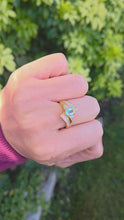 Load and play video in Gallery viewer, 2370 18ct Gold Blue Aquamarine  Diamonds Bypass Cocktail Ring