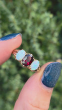 Load and play video in Gallery viewer, 2275 Vintage: 9ct Gold Cabochon White Opals Garnet 3-Stone Ring- From 1980