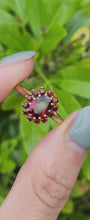 Load and play video in Gallery viewer, 1662: Vintage: 9ct Gold Almandine Garnets Flowerhead Ring- lovely mature colours