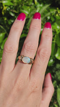 Load and play video in Gallery viewer, 2008: Vintage; 9ct Gold Large Cabochon White Opal Signet Ring- colourful statement