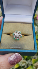 Load and play video in Gallery viewer, 6066 Vintage: 18ct Gold 6 Emeralds 7 Brilliant Cut Diamonds Cluster Ring