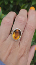 Load and play video in Gallery viewer, 1957: Vintage; 14ct Gold Large (8ct) Oval Yellow Citrine Solitaire Ring- Old, lovely mature stone.
