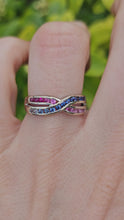 Cargar y reproducir el video en el visor de la galería, 1429: Vintage: 9ct White Gold Rubies Sapphires Crossover Ring- crisp, colourful, eye candy