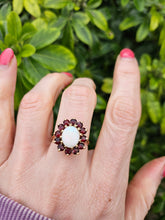 Cargar imagen en el visor de la galería, 0775: Vintage: 9ct Gold White Opal Red Garnets Flower- Head Cocktail Ring- Date-Mark 1977
