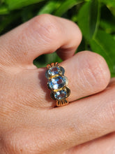 Load image into Gallery viewer, 1980: Vintage; 9ct Gold Blue Aquamarines Trilogy Ring- beautifully balanced blue