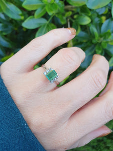 5770: Vintage: 18ct White Gold Emerald Cut Emerald 6 Brilliant Cut Diamonds Dress Ring-