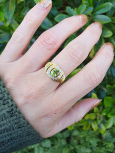 5922:  Vintage: 18ct gold Green Peridot White Sapphires Dress Ring- lovely stones, statement weight