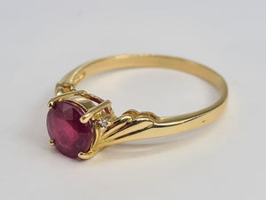 5988:  Vintage: 9ct Gold Round Cut Ruby Brilliant Cut Diamonds Dress Ring- classic combination and design