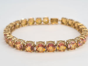 0146: Vintage: 9ct Gold 24 Mystic Topaz Statement Bracelet (19cm) - a festival of colours