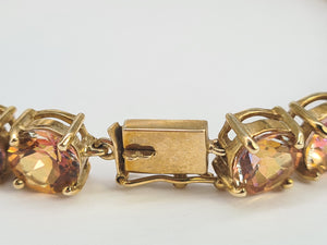 0146: Vintage: 9ct Gold 24 Mystic Topaz Statement Bracelet (19cm) - a festival of colours