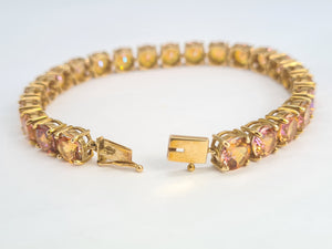 0146: Vintage: 9ct Gold 24 Mystic Topaz Statement Bracelet (19cm) - a festival of colours