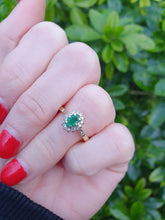 Load image into Gallery viewer, 7007:Vintage: 18ct Gold Oval Emerald 14 Brilliant Cut Diamonds Cluster Ring- lovely quality, hallmarked in London
