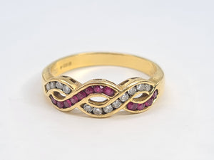 7023:  Vintage: 18ct Gold Rubies Diamonds Dress Ring- From London 1990- exquisite design- nice weight- Hallmarked in 1990   CONDITION: Excellen