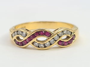 7023:  Vintage: 18ct Gold Rubies Diamonds Dress Ring- From London 1990- exquisite design- nice weight- Hallmarked in 1990   CONDITION: Excellen