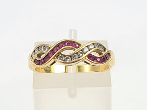 7023:  Vintage: 18ct Gold Rubies Diamonds Dress Ring- From London 1990- exquisite design- nice weight- Hallmarked in 1990   CONDITION: Excellen