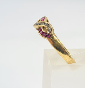 7023:  Vintage: 18ct Gold Rubies Diamonds Dress Ring- From London 1990- exquisite design- nice weight- Hallmarked in 1990   CONDITION: Excellen