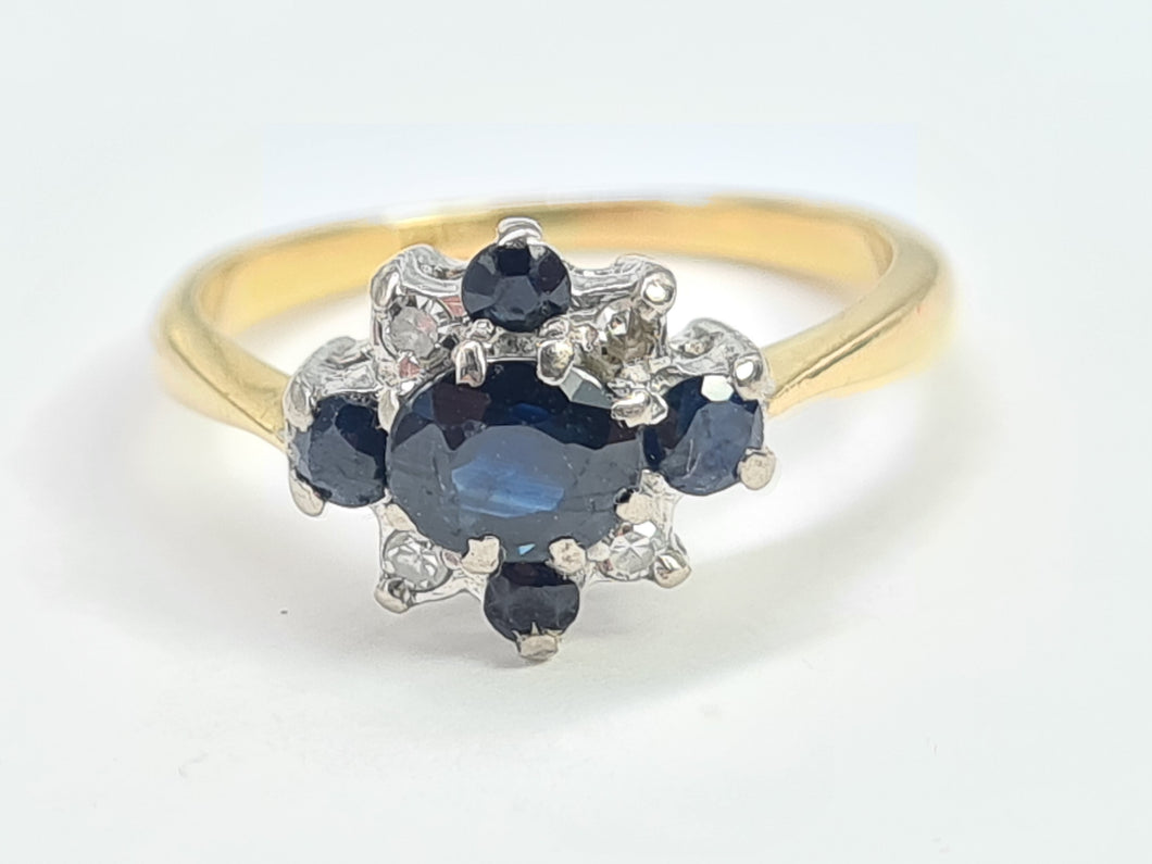 7024:  Vintage: 18ct Gold French Blue Sapphires Brilliant Cut Diamonds Cluster Ring- elegant sophistication