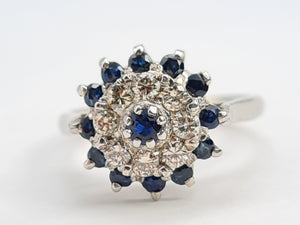 7130:  Vintage: 18ct White Gold Sapphires 8 Diamonds Cluster Rin- sparkling, symmetrical, 51 years old