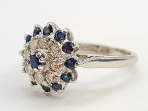 7130:  Vintage: 18ct White Gold Sapphires 8 Diamonds Cluster Rin- sparkling, symmetrical, 51 years old