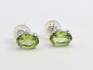 7269:Vintage Rare: Platinum Peridot Stud Earrings- crisp platinum showcasing gorgeous green peridots