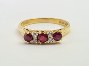 7281: Vintage(1977): 18ct Gold Rubies Diamonds Dress Ring- very fine example, blood red rubies,