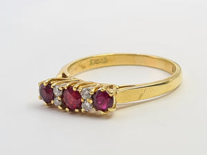 7281: Vintage(1977): 18ct Gold Rubies Diamonds Dress Ring- very fine example, blood red rubies,