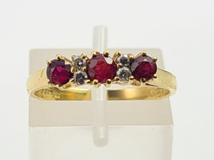 7281: Vintage(1977): 18ct Gold Rubies Diamonds Dress Ring- very fine example, blood red rubies,