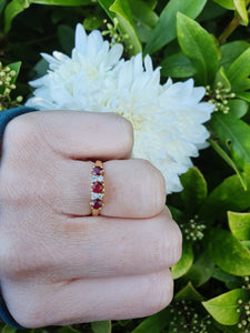 7281: Vintage(1977): 18ct Gold Rubies Diamonds Dress Ring- very fine example, blood red rubies,