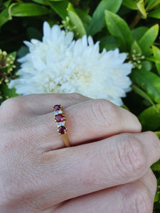 7281: Vintage(1977): 18ct Gold Rubies Diamonds Dress Ring- very fine example, blood red rubies,