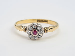 7365-Antique: 18ct Gold Platinum Set Ruby 8 Diamonds Flower Head Ring- over 100 years old