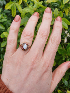 7271- Vintage (1960's) Opal Garnets Halo Cocktail Ring- lovely combination