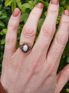 7271- Vintage (1960's) Opal Garnets Halo Cocktail Ring- lovely combination