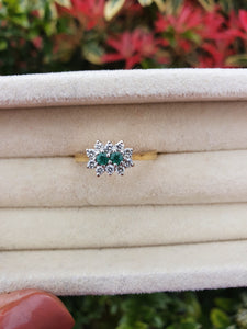 7418: Vintage (1983) Rare 18ct Gold Two Emeralds 10 Diamonds Dress Ring- lovely combination