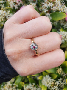 7365-Antique: 18ct Gold Platinum Set Ruby 8 Diamonds Flower Head Ring- over 100 years old