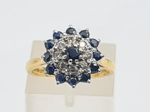 7482: Vintage (1973) Blue Sapphires 8 Diamonds Cluster Ring- Sparkling symmetry at 51 years old