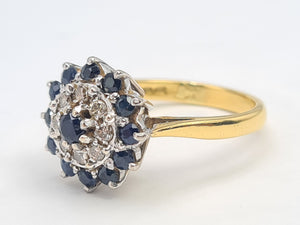 7482: Vintage (1973) Blue Sapphires 8 Diamonds Cluster Ring- Sparkling symmetry at 51 years old