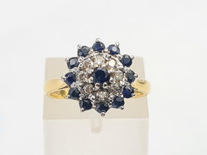 7482: Vintage (1973) Blue Sapphires 8 Diamonds Cluster Ring- Sparkling symmetry at 51 years old