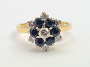 7498: Vintage: 18ct Gold 7 Sapphires 6 Diamonds (0.6ct) Diamonds Flower Head Ring- from 1978- 46 years old