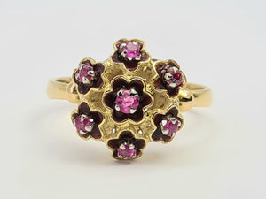 7476: Vintage; 18ct Gold 7 Rubies Floral Cluster Cocktail Ring- geometric set