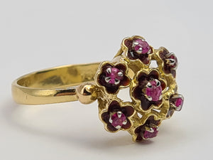 7476: Vintage; 18ct Gold 7 Rubies Floral Cluster Cocktail Ring- geometric set