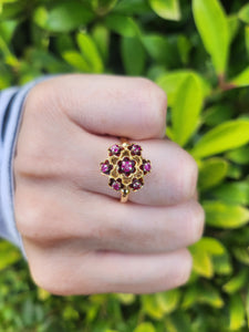 7476: Vintage; 18ct Gold 7 Rubies Floral Cluster Cocktail Ring- geometric set