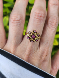 7476: Vintage; 18ct Gold 7 Rubies Floral Cluster Cocktail Ring- geometric set