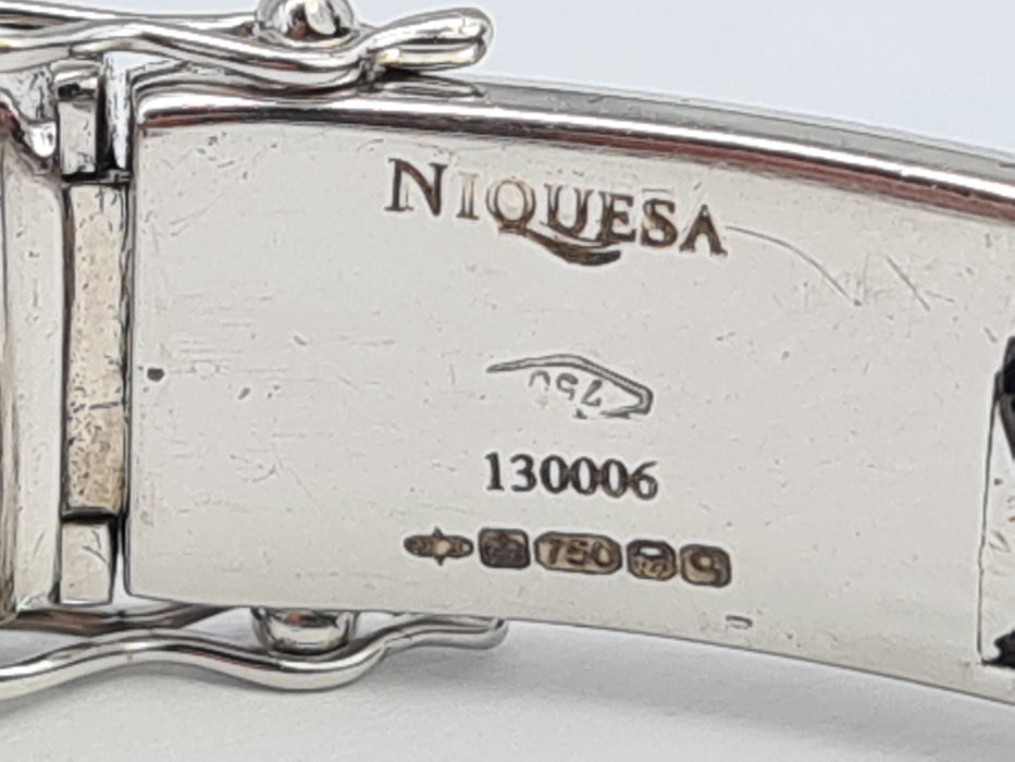 7658: Starlight Ruby White Gold Bangle by Niquesa London - 7.1ct Rubies