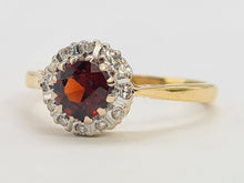 Load image into Gallery viewer, A8015: Vintage (1962) 18ct Gold Almandine Garnet 12 Round Cut Diamonds Daisy Ring- 62 years old and looking great
