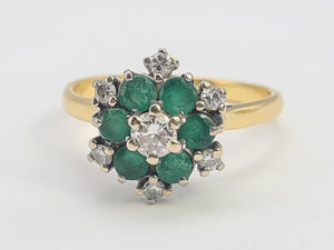 9083:Vintage: 18ct Gold 6 Emeralds 7 Diamonds Flower Head Ring- timeless classic. nice weight, sparkling