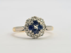 8089: Vintage: (1965)- 18ct Gold Blue Sapphires 8 Round Cut Diamonds Cluster Ring- petite, sparkling, geometric set