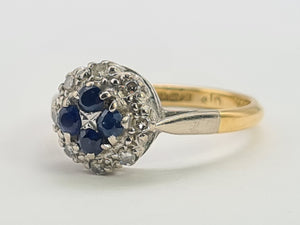 8089: Vintage: (1965)- 18ct Gold Blue Sapphires 8 Round Cut Diamonds Cluster Ring- petite, sparkling, geometric set