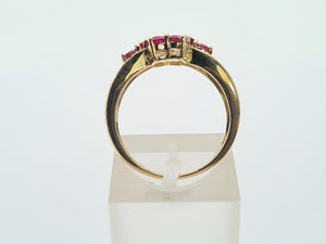 8217: Vintage: 9ct Gold 9 Rich Red Rubies Geometric Set Ring