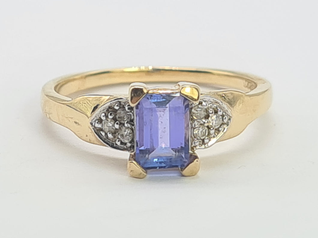 8232: Vintage; 9ct Gold Emerald cut Tanzanite Diamonds Dress; Ring- lovely cut and colour